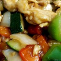 Kung Pao Chicken · Hot and spicy. Sauteed chicken with peppers, onions, zucchini, peanuts, and chili.
.

