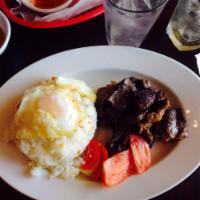 Tapsilog · Sliced beef in house marinade, pan fried. Served with 2  eggs and scoop of garlic rice.