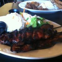 Pork BBQ · Charbroiled savory pork marinated in our house special sauce.
