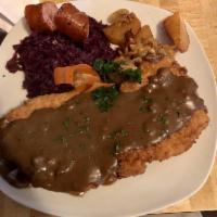 Jager Schnitzel · Breaded Pork Loin finished with Mushroom sauce. Soup of the day included.