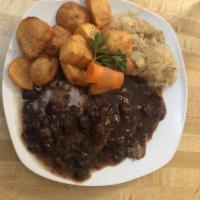 Sauerbraten · Beef marinated in German style Sweet and Sour sauce. Soup of the day included.