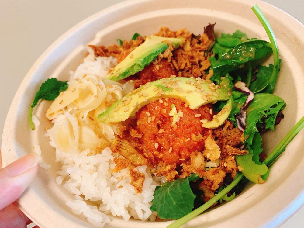 Spicy Tuna Bowl · Spicy tuna, mixed greens, fried onion, onion dressing, sesame seeds with white ginger and avocado over rice.