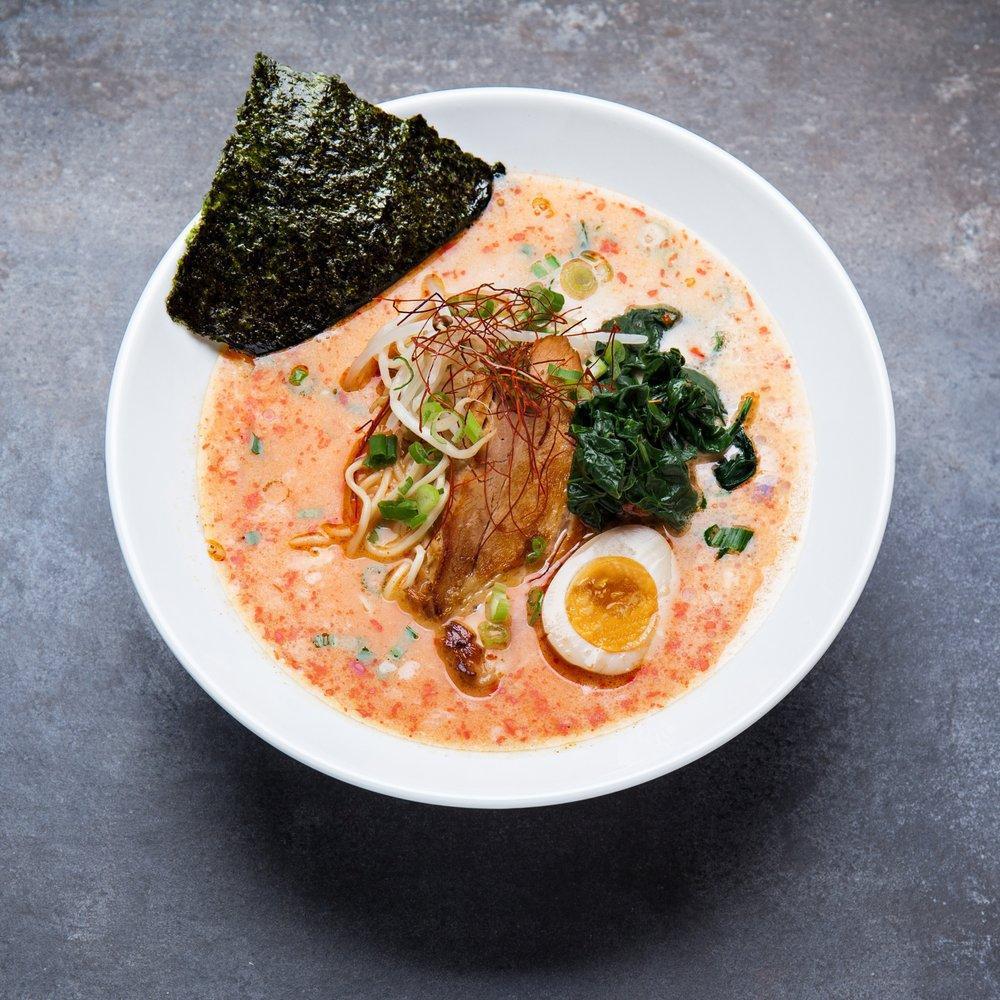 The Blaze Spicy Tonkotsu · Choice of protein: pork, chicken, or tofu. Spicy creamy pork broth, bean sprouts, spinach, green onion and seasoned egg.