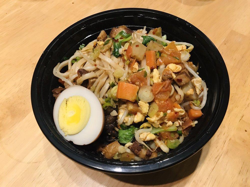 The X Bowl · Popular dish in Xian, China. A spicy non-broth dish using egg noodles and a few of our toppings. Hot oil is drizzled on top of the spices to coat the noodles with the flavor.