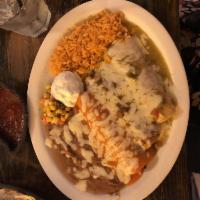 Trio Enchiladas · 3 enchiladas 1 chile Verde, 1 chicken, and 1 beef served with rice, beans, and sour cream.