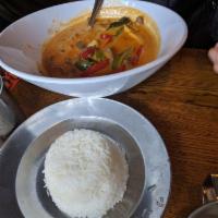 Red Curry · Choice of meat in red curry sauce, Thai eggplant, bamboo shoots, bell peppers and basil leav...