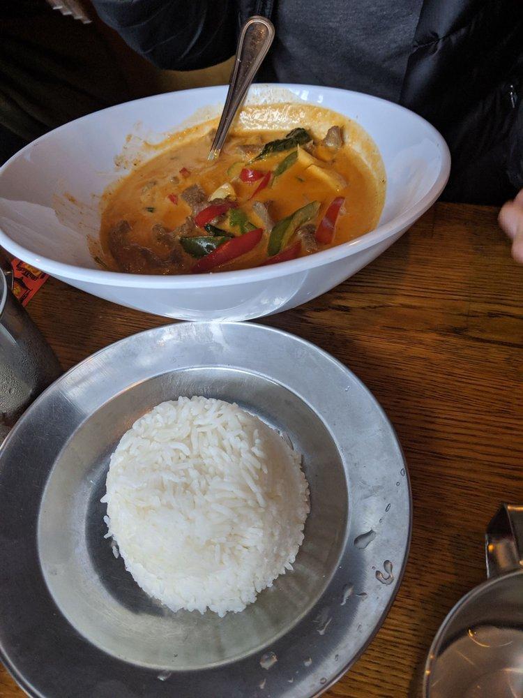 Red Curry · Choice of meat in red curry sauce, Thai eggplant, bamboo shoots, bell peppers and basil leaves. Spicy.
