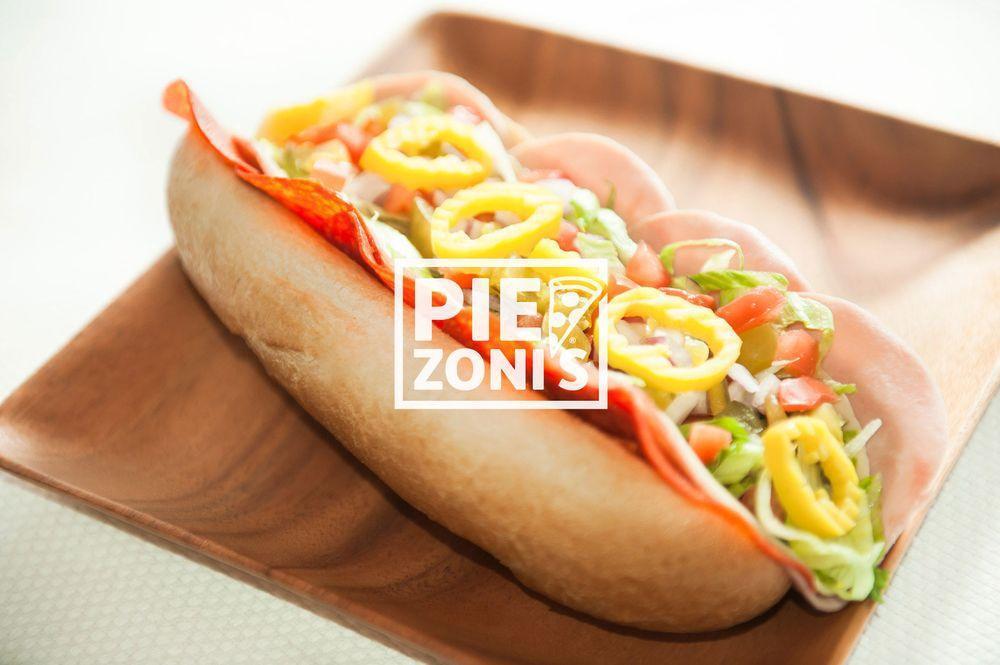 Italian Sub · Ham, pepperoni, salami, provolone cheese, crisp lettuce, tomatoes, red onions, banana peppers, pickles and special oil.