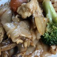 Drunken Noodles · Pad kee mao. Pan-fried wide rice noodles in chili sauce with basil, broccoli, mushrooms, bam...