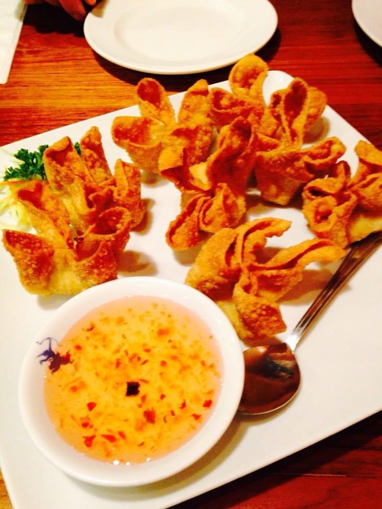 Crab Delight · Deep fried wontons stuffed with cream cheese and crab meat, served with plum sauce.