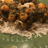 Chana Shaag · Chick peas and spinach cooked in a spice flavored sauce.