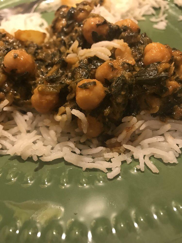 Chana Shaag · Chick peas and spinach cooked in a spice flavored sauce.