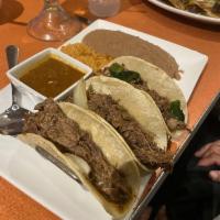 Tacos · Choice of 2 crispy, puffed or soft flour tacos filled with seasoned beef or shredded chicken...