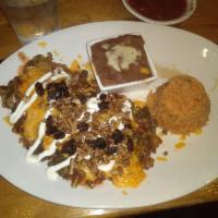 Chile Relleno · A lightly breaded Anaheim pepper with your choice of filling and sauce. Sprinkled with raisi...