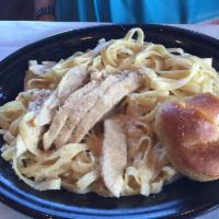 Chicken Alfredo · Fresh fettuccini blended with our rich Alfredo sauce and topped with a grilled chicken breas...