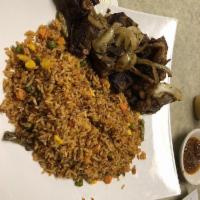 Jollof Rice · Rice cooked in a special stew with a combination of west African spices and herbs with mixed...