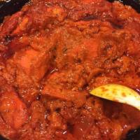 Chicken Tikka Masala · Boneless pieces of tandoori chicken cooked in a rich onion and tomato gravy, creamy sauce. F...