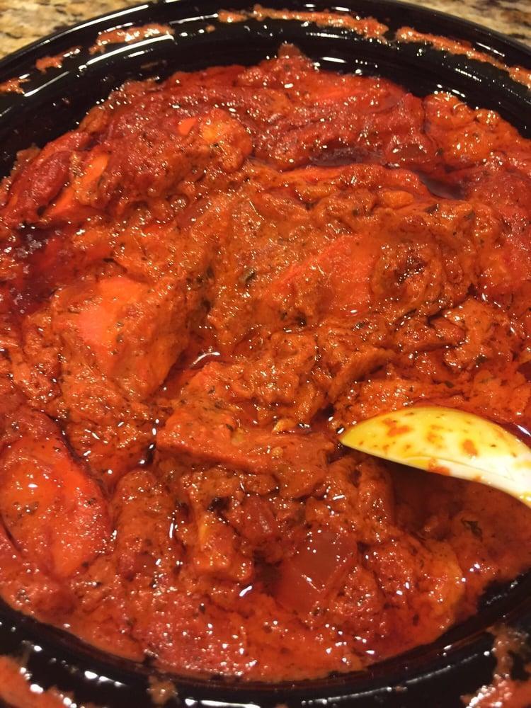 Chicken Tikka Masala · Boneless pieces of tandoori chicken cooked in a rich onion and tomato gravy, creamy sauce. Flavored with fenugreek leaves.
