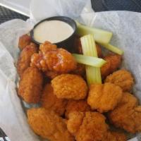 Boneless Wings · 100% all-natural chicken wings tossed in our signature sauces and dry rubs