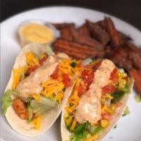 2 Shrimp Tacos · Lettuce, tomato, corn salsa and remoulade. Served with your choice of 1 side.