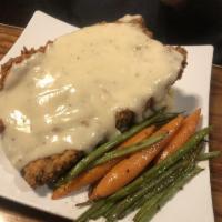 Chicken Fried Steak · Served with mashed potatoes and vegetable of the day.