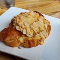 Almond Croissant · Crunchy croissant with delicious almond cream filling.