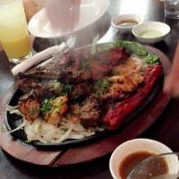 Lamb Chops Platter · Lamb chops south Asian style, richly marinated with yogurt and spices. Grilled and served wi...