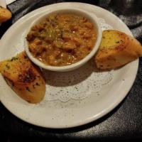Crawfish Etouffee · Peeled crawfish tails mixed with onions, bell peppers and celery. Simmered in a cream sauce,...