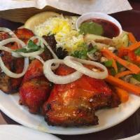 Tandoori Chicken · Juicy spring bone-in chicken marinated with yogurt and flavorful and fresh ground spices. Se...