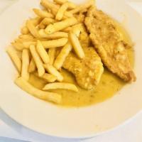 Chicken Francese · Chicken scallopine dipped in egg and sauteed in a lemon and butter sauce.