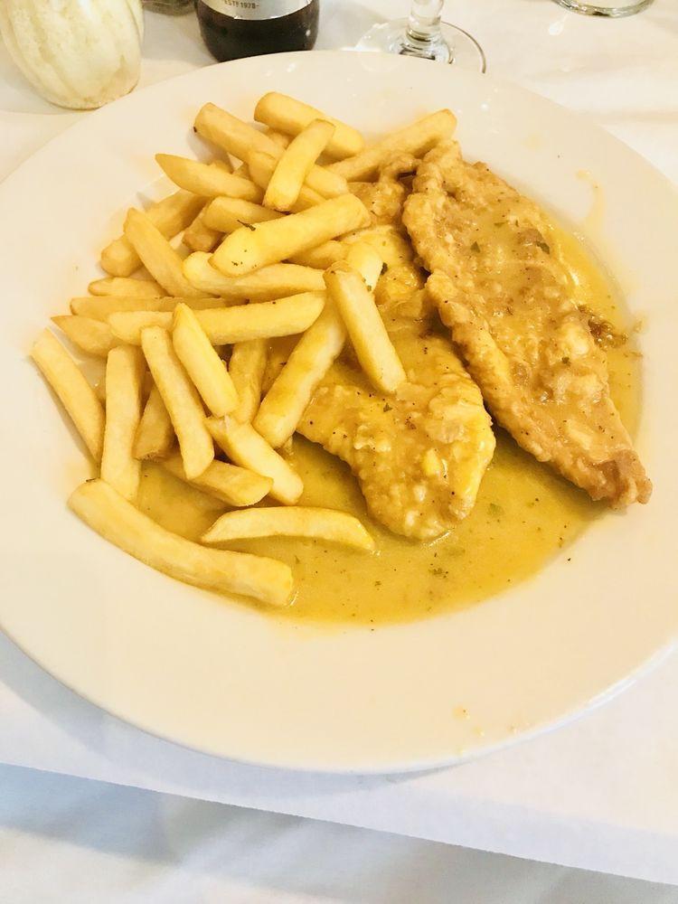 Chicken Francese · Chicken scallopine dipped in egg and sauteed in a lemon and butter sauce.