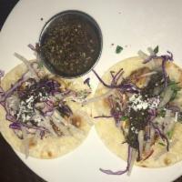 Blackened Shrimp Tacos · Jicima slaw, queso fresco, chipotle cream and habanero salsa
