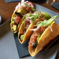 Ahi Tuna Tacos · Fresh avocado, Citrus wasabi vinaigrette and Crunchy tortilla