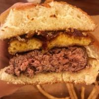 The Motherload Burger · 8 oz. bison patty, truffle mac n cheese patty and applewood bacon topped with cheese sauce o...