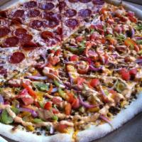 Southwest Taco Pizza · Spicy ground beef, peppers, onions, tomatoes, cilantro, lime juice, cheddar cheese and south...
