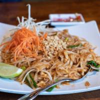 Pad Thai · Wok stir fried Thai rice noodles with egg, tofu, bean sprouts, green onions and topped with ...