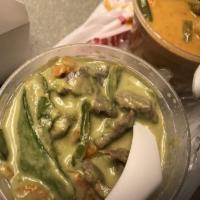 Avocado Curry · Avocado, bell peppers, carrots and snow peas. Simmered in creamy green curry and coconut mil...