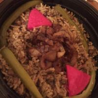 Mujadara · A traditional home recipe of rice and lentils topped with caramelized onions and served with...