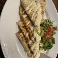 Quesadillas · Choice of handmade choice of tortilla, stuffed with cheese topped with lettuce, tomato, chee...