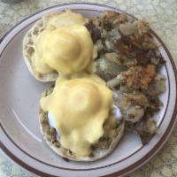 Crab Cakes Benedict · On English Muffin topped with Hollandaise Sauce