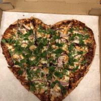 BBQ Chicken Pizza · Mozzarella cheese, chicken breast, red onions and cilantro.