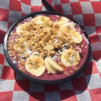 Acai Bowl · Frozen acai blend, strawberries, blueberries, banana, granola, shaved coconut, with a drizzl...