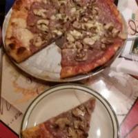 Smoked Italian Sausage Pizza · The boot's homemade Tuscan style Italian sausage, fresh pizza sauce, fresh mushrooms, melted...