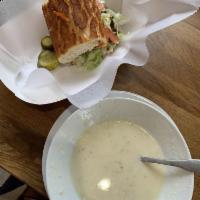 Clam Chowder Soup · A thick hearty soup consisting of clams, potatoes, onions within a milk or cream base.