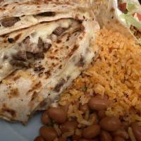 Quesadilla · 12 inch flour tortilla filled with your choice of meat and mozzarella shredded cheese. Serve...