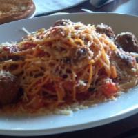 Spaghetti · Spaghetti noodles mixed and topped with homemade marinara sauce.