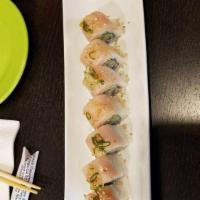 Rainbow Roll · In: imitation crab, avocado and cucumber. Top: salmon, tuna, hamachi, albacore and shrimp.