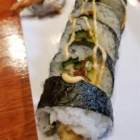 Spider Roll · Tempura soft shell crab, cucumber, avocado, yamagobo, tobiko and topped with spicy aioli. Sp...