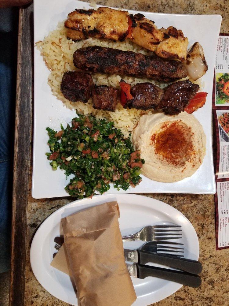 Kabob Plate · One skewer of beef and one skewer of chicken. Served with rice, hummus, your choice of fattoush or tabouli salad and pita bread.