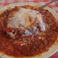 Lasagna · Italian meals by the tray with garlic bread.